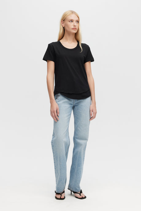 Woman wearing black Ava Mock Layer Tee by CHRLDR, front view