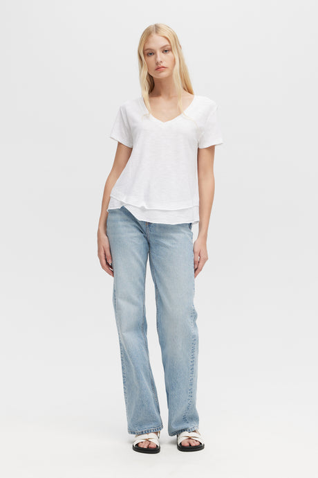 Woman wearing Ava V-Neck Mock Layer Tee by CHRLDR, front view